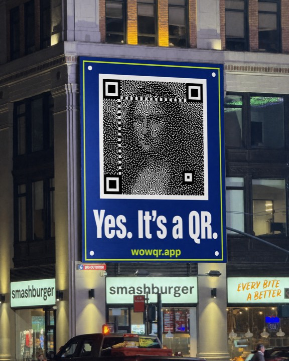 Billboard on a building at dusk